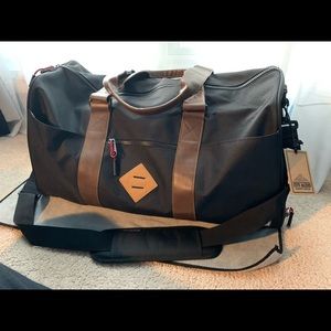 Steve Madden Black and Tan duffle!